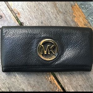 Michael Kors pebbled leather wallet black.